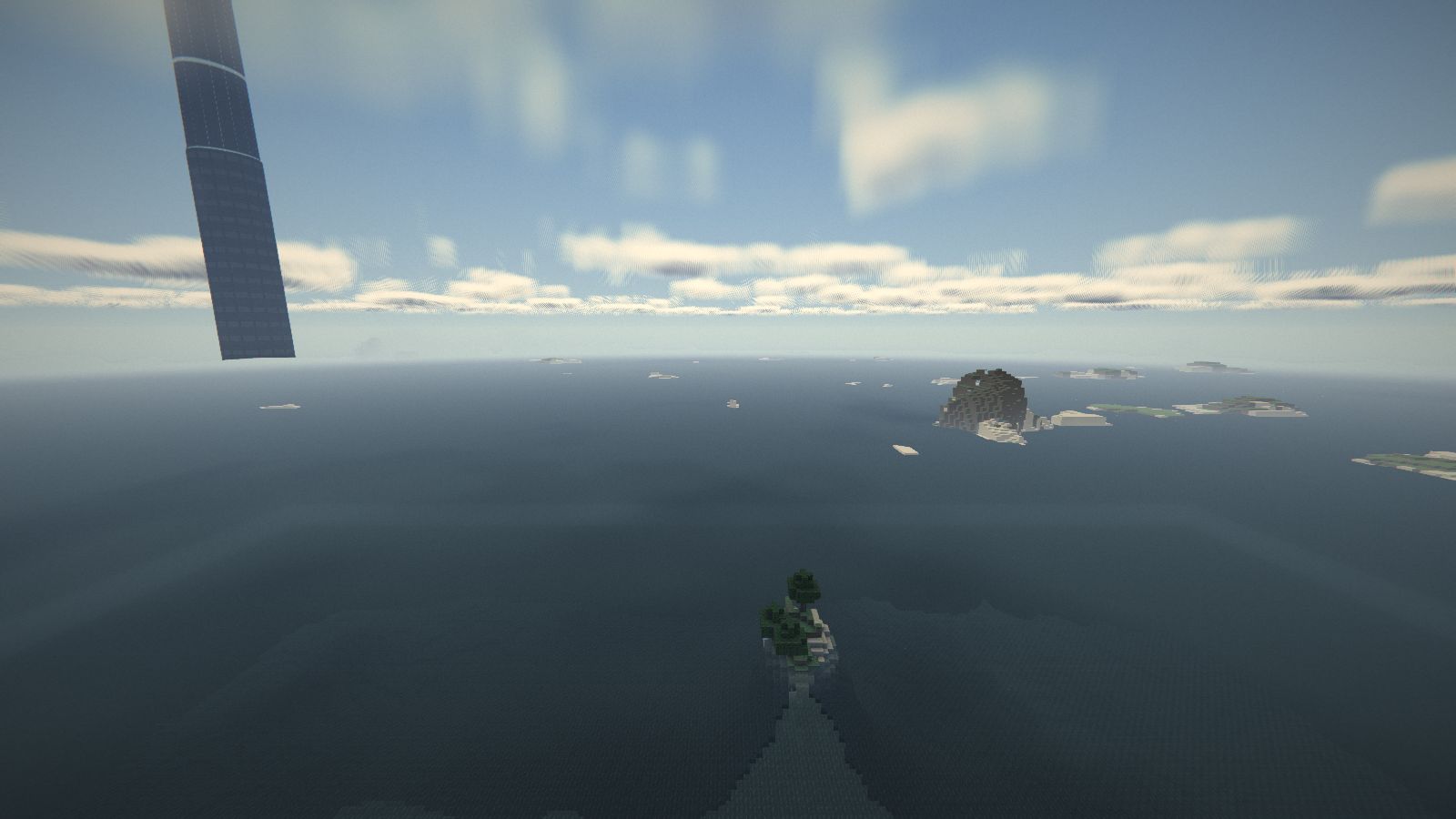 Vue en hauteur : îles et côtes jusqu'à l'horizon, sous les nuages