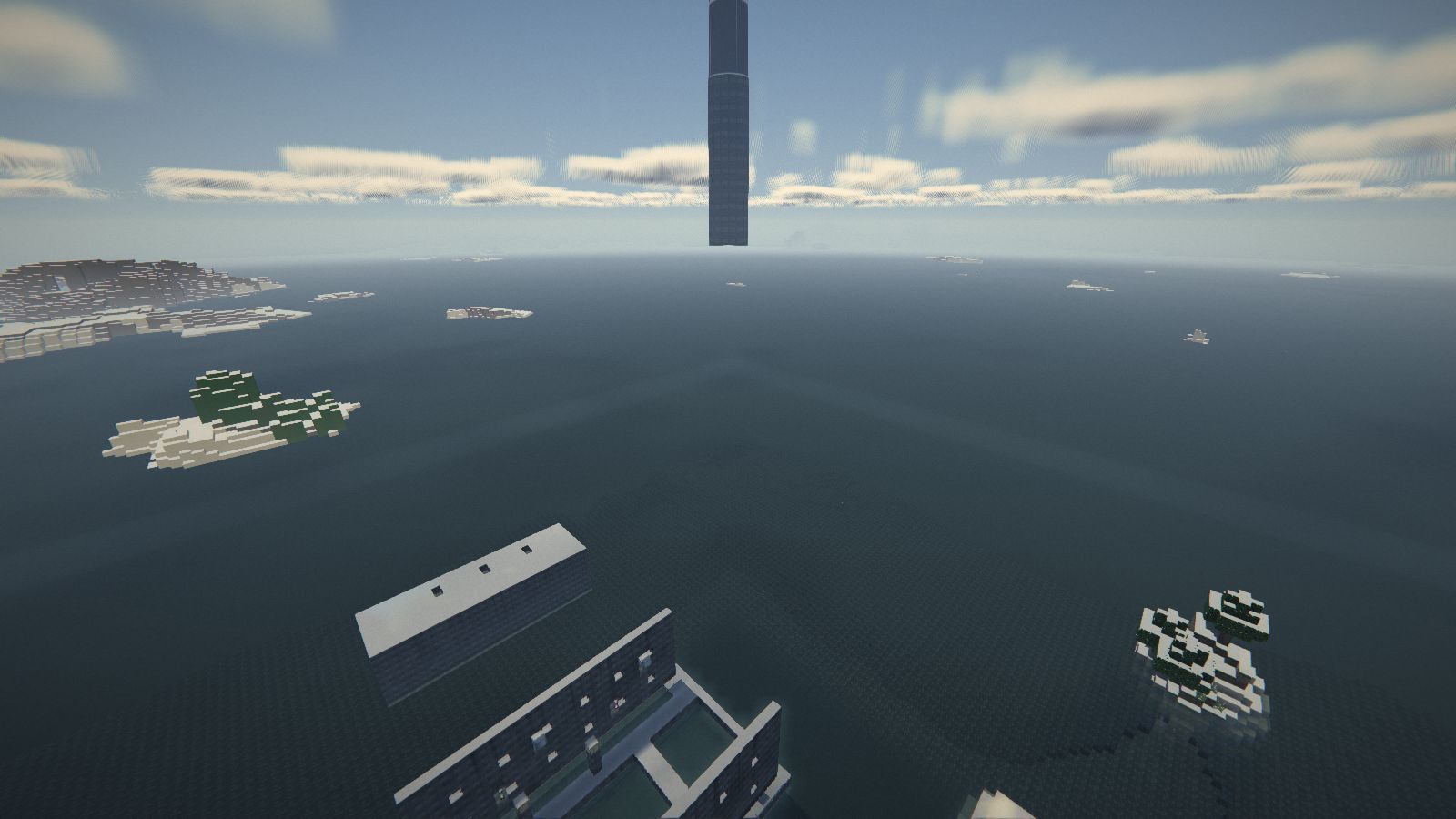 La ville de test vue d'en haut, toits blancs et îles enneigées à l'horizon